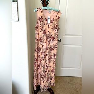 Size 16 peach sleeveless long lined dress with floral design and original tag.